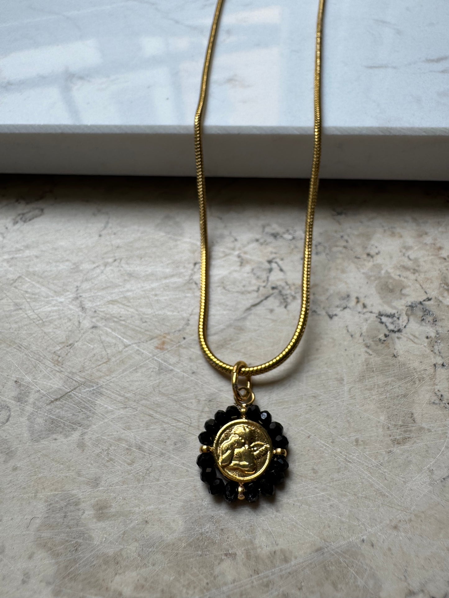 Collana Putto